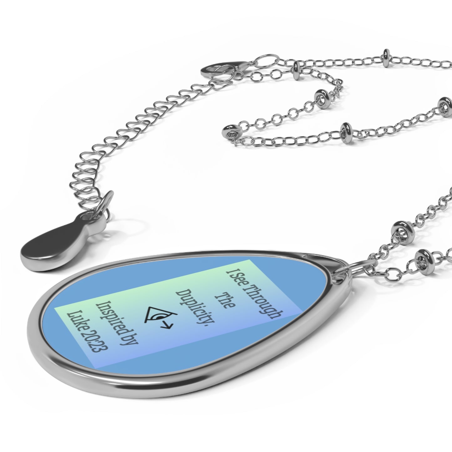 I See Through The Duplicity. - Inspired by Luke 20:23. - Oval Necklace
